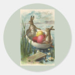 Vintage Easter Bunnies and Easter Eggs in a Boat Round Sticker