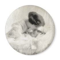 Vintage Mother Kissing Baby in Bassinet