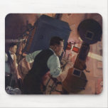 Vintage Projectionist in a Movie Theatre mousepads