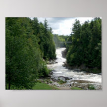 Waterfall with trees and some rocks posters
