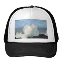 Waves breaking on a volcanic shore hat