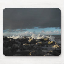 waves hit some rocks mousepads