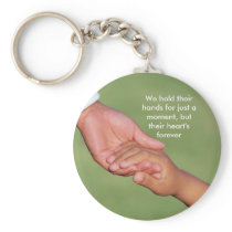 We hold their hands for just a moment, ... key chains