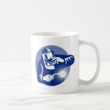 Welder at work welding set inside circle mug