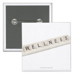 Wellness Spelled On A Word Board Game. Pinback Buttons