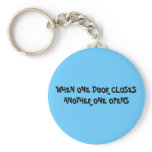 WHEN ONE DOOR CLOSES ANOTHER ONE OPENS keychains
