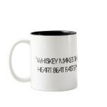 "WHISKEY MAKES THE HEART BEAT FASTER" mugs