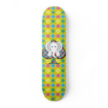 White elephant on red blue spade skateboard deck