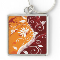 White Flowers on Orange and Burgundy Grunge Keychains