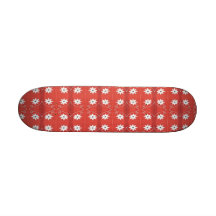 white flowers on red skate board