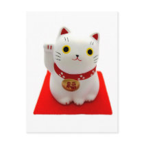 White Maneki Neko on a Red Carpet