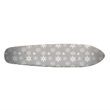 White snowflakes on silver skateboard