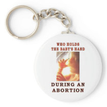 WHO HOLDS THE BABY'S HAND