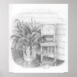 Wicker chair and fern posters
