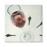 Wine glass with flower petals inside magnets