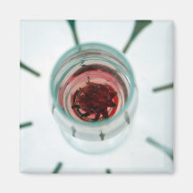 Wine glass with flower petals inside magnets