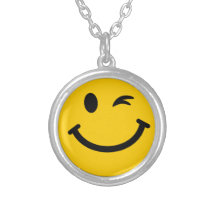 Winking smiley face pendants