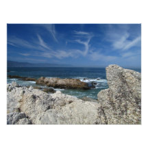 Wispy Clouds Over The Rocks Photo