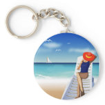 woman laying on the beach keychains