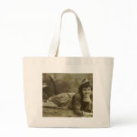 Woman laying on the grass bags