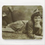 Woman laying on the grass mouse pads
