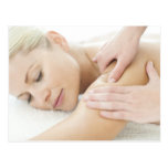 Woman relaxing at a spa while receiving a 2 post card