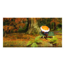 Woman siting with umbrella