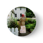 Woman With Striped Jacket and Flowered Skirt buttons