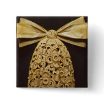 Woodcarving of a cravat buttons