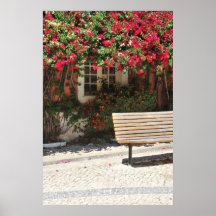 Wooden bench and a window with clinging flowers poster