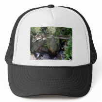 Wooden Bridge Over The Water In The Forest With Bi Trucker Hats