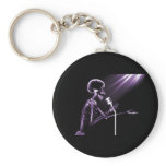 X-RAY SKELETON SINGING ON RETRO MIC - PURPLE keychains