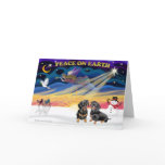 XmasSunrise-2 black Dachshunds Greeting Card