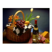 Yellow Picnic basket with wine, cheese, bread and Post Card