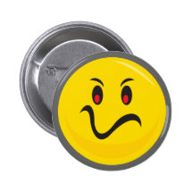 Yellow smiley face that is annoyed pin