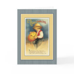 Young boy is carving a jack o' lantern greeting cards