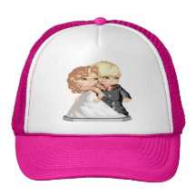 Young couple dressed for wedding hat