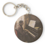 Young Man Playing The Piano by Gustave Caillebotte keychains