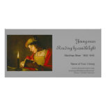 Young man reading by candlelight photo greeting card