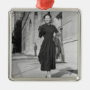Search for black dress christmas tree decorations Looking at camera