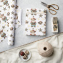 Search for cowboy hat wrapping paper Santa