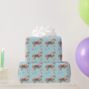 Search for carousel horse wrapping paper Blue