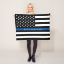 Search for flag blankets Policeman