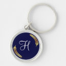 Search for gold leaves key rings Initial