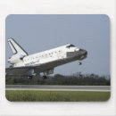 Search for arrive mouse mats Space travel