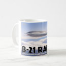 Search for raiders mugs Bomber