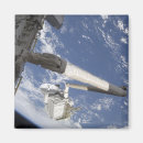Search for manipulate magnets Remote manipulator system