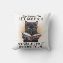 Search for black cat cushions Humour