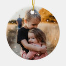 Search for gold star christmas tree decorations Family photo