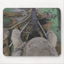 Search for machine gun mouse mats Belt fed